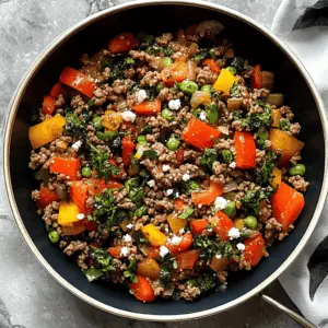 Whip up a delightful Mediterranean Ground Beef Stir Fry that's bursting with fresh flavors! Featuring seasoned ground beef, vibrant veggies, and aromatic herbs, this quick recipe is perfect for busy weeknights. Save this easy dish for family dinners or meal prep, and enjoy a taste of the Mediterranean at home!