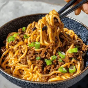 Looking for a quick and satisfying dinner? These Mongolian Ground Beef Noodles are packed with flavor and require just a few simple ingredients! With tender beef, fresh vegetables, and a savory sauce, this dish is perfect for busy weeknights or family gatherings. Save this recipe for a delicious meal that everyone will love!