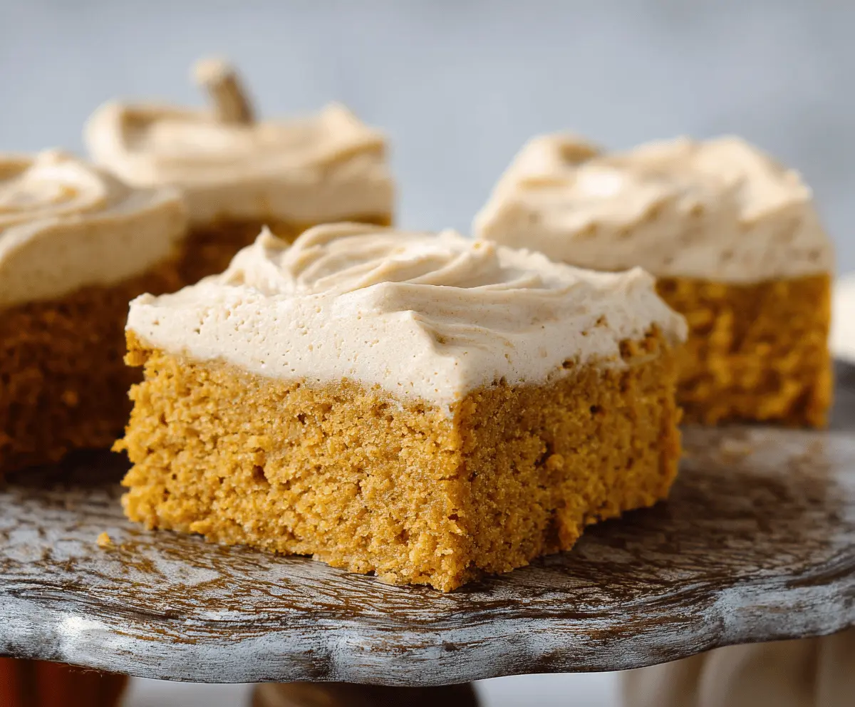 Delicious homemade pumpkin bars topped with creamy brown sugar frosting, perfect for fall dessert