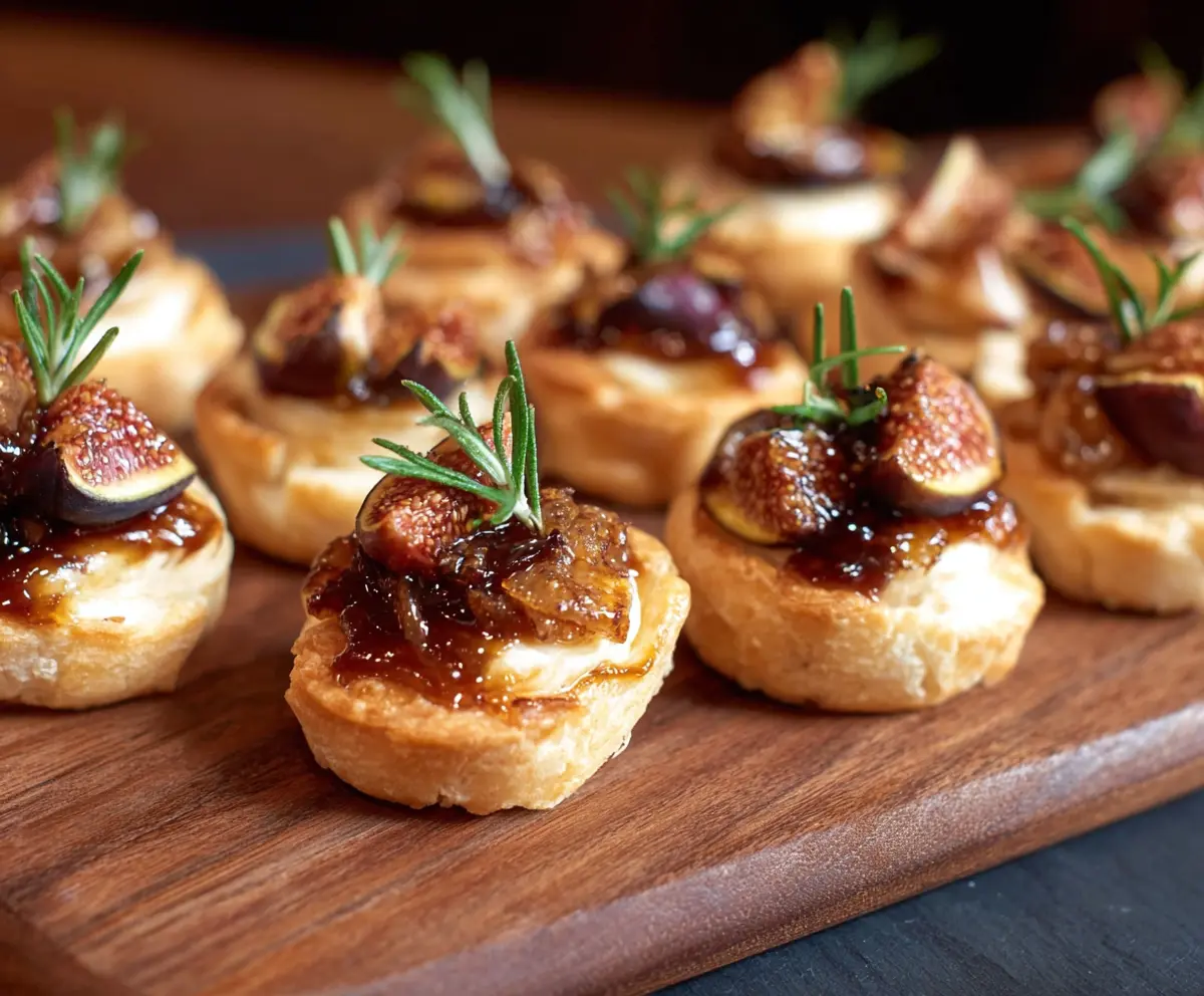 Delicious Fig Brie Bites served on a white plate, perfect for appetizers and entertaining.