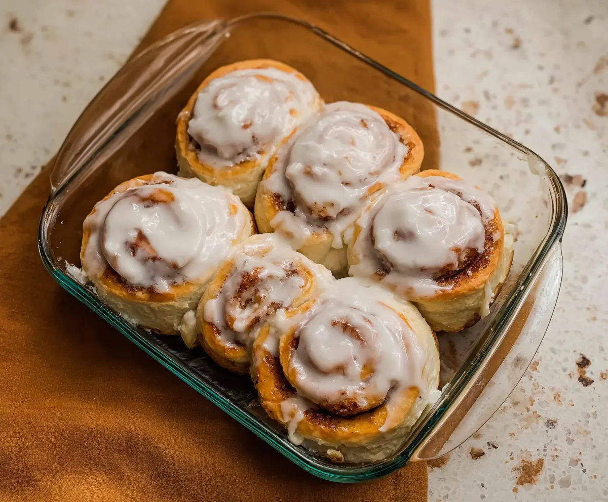 Delicious cottage cheese cinnamon rolls fresh out of the oven, showcasing their golden-brown crust and swirls of cinnamon filling.