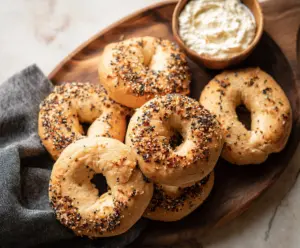 Delicious homemade almond flour Greek yogurt bagels on a plate, perfect for healthy breakfast options.