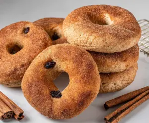Delicious cinnamon bagels with a golden-brown crust and a swirl of cinnamon filling.